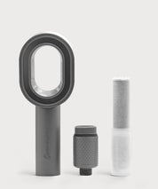 Grauer AERO Shower Duschkopf mit Kalkmodul von ProEnergetic und separater Filterkartusche auf hellem Hintergrund.