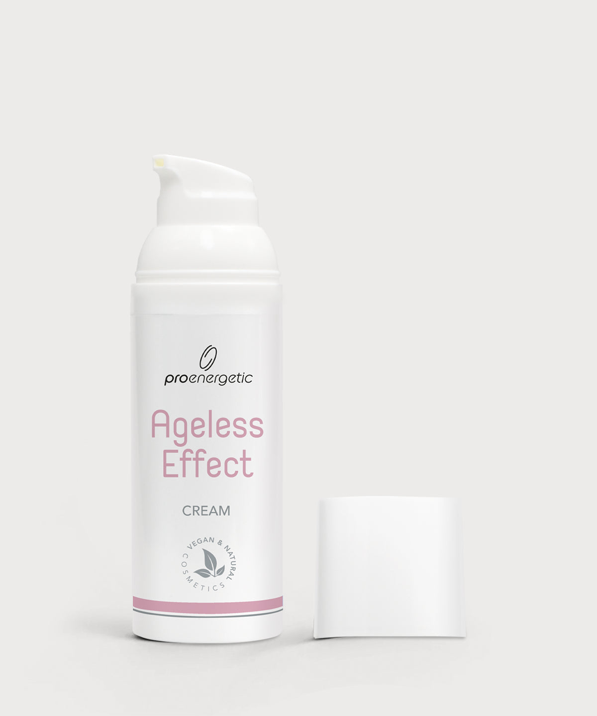 Ageless Effect Cream in weißer Pumptube mit abgenommenem Deckel vor neutralem Hintergrund, minimalistisches Produktfoto.