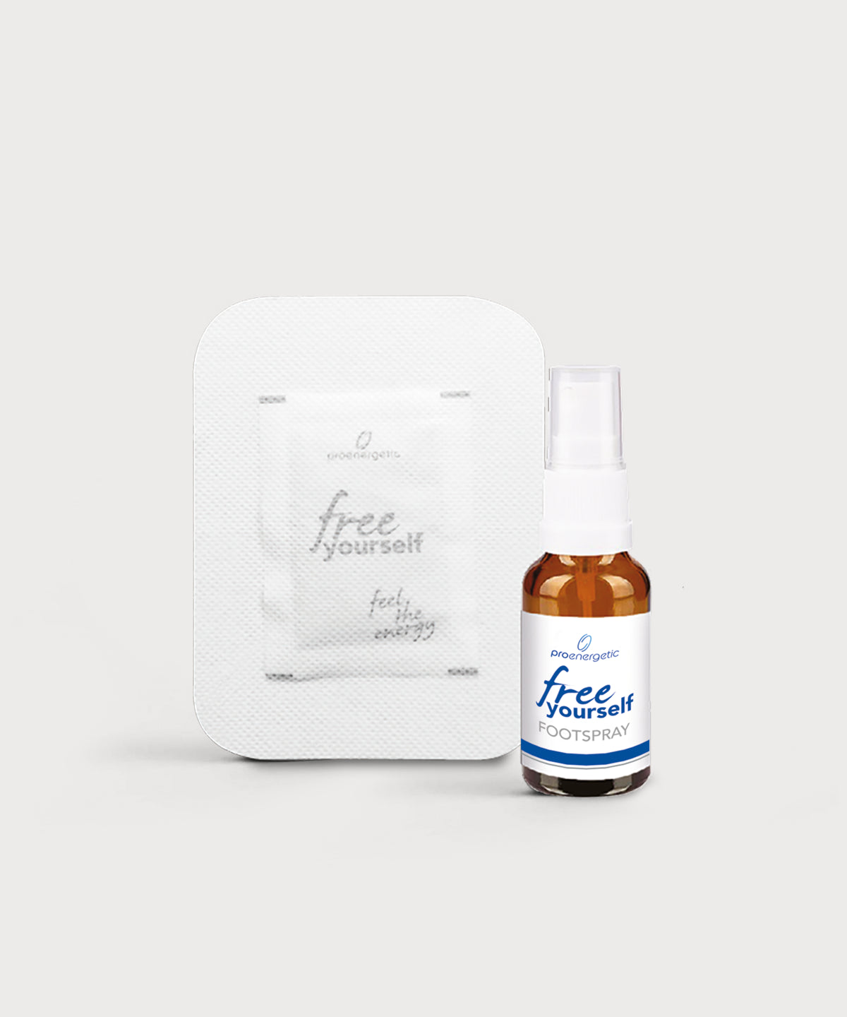 Verpacktes free yourself Fußpad neben kleiner Glasflasche free yourself Foot Spray von ProEnergetic mit weißem Sprühkopf.