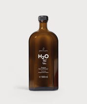 Braune Glasflasche H2O Fit von ProEnergetic mit schwarzem Schraubverschluss und weißer Beschriftung 500 ml.