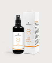 Schwarze Glasflasche I am focused and powerful Spray von ProEnergetic neben weißer Produktverpackung mit orangefarbenem Symbol.