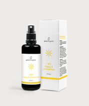 Schwarze Glasflasche I am happy and prosperous Spray von ProEnergetic neben weißer Produktverpackung mit gelbem Sternsymbol.