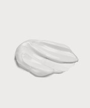 Cremige Textur des Pretty Hands & Feet Balms als Nahaufnahme – reichhaltig, glatt und gleichmäßig streichfähig für intensive Pflege von Händen und Füßen.
