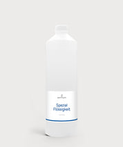 Weiße Flasche mit ProEnergetic Logo und Aufschrift Spezial Flüssigkeit Wohnen 1 Liter.